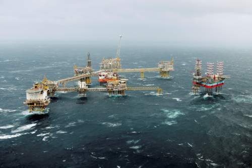 1969 commercial oil rigs in the Ekotisk field in the North sea near Norway.